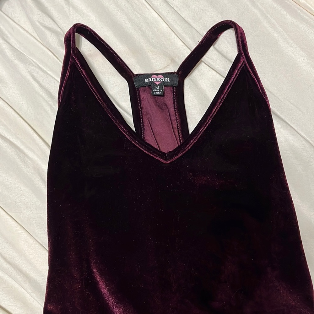 Plum velvet bodysuit.